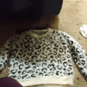 An extra small cheetah print fluffy sweater